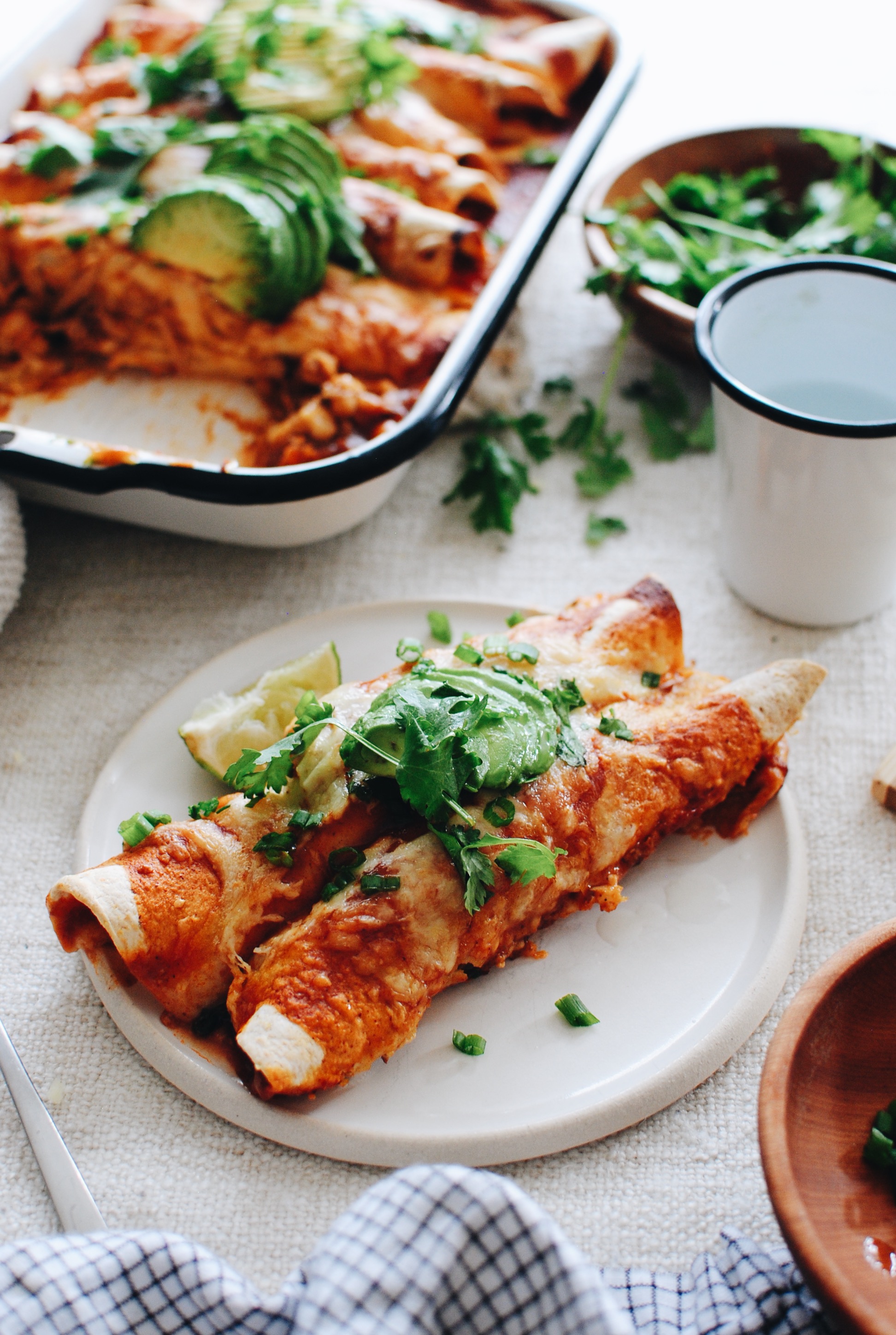 Shredded Pork and Hominy Enchiladas / Bev Cooks