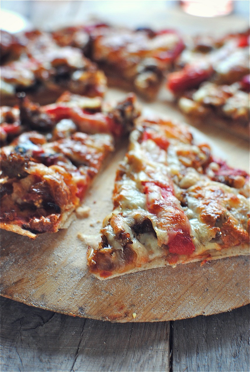 Thin Crust Pizza with Caramelized Onions, Sausage and Roasted Red ...