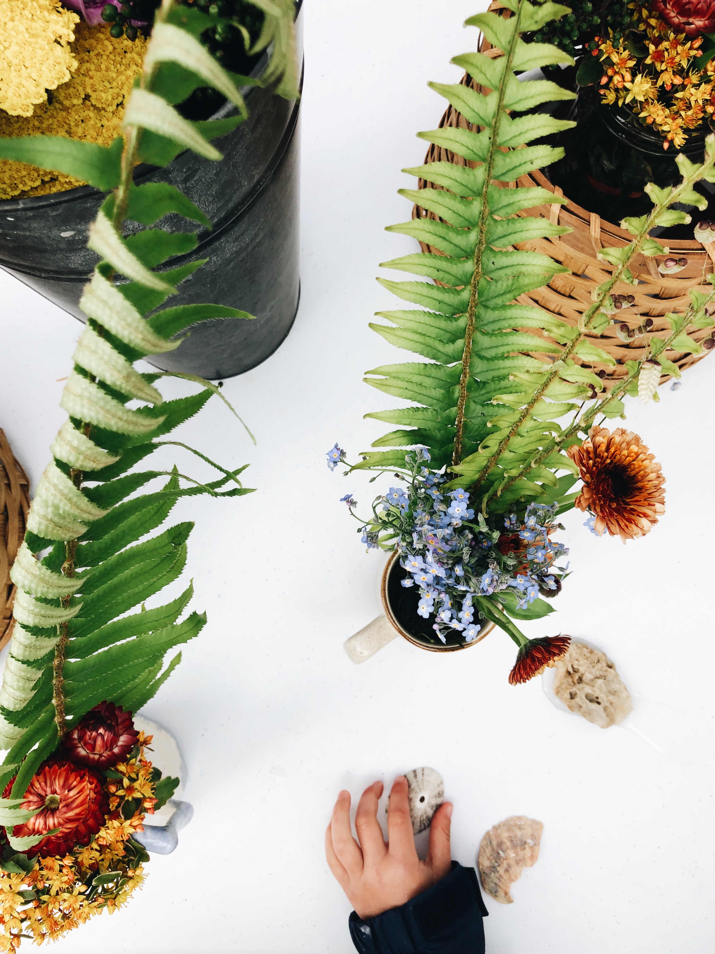 hand and flowers