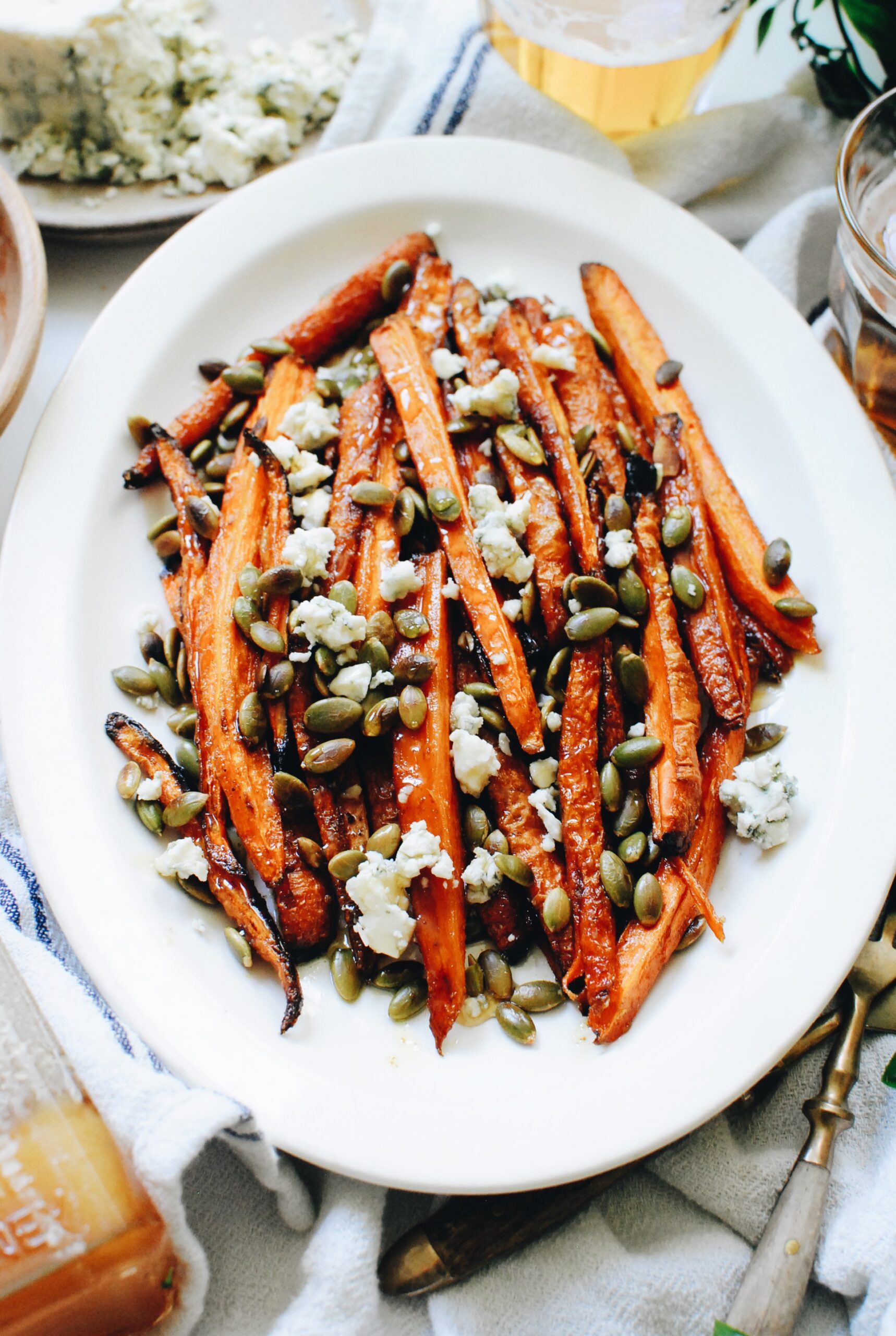 Roasted Carrots with Blue Cheese and Pepitas - Bev Cooks